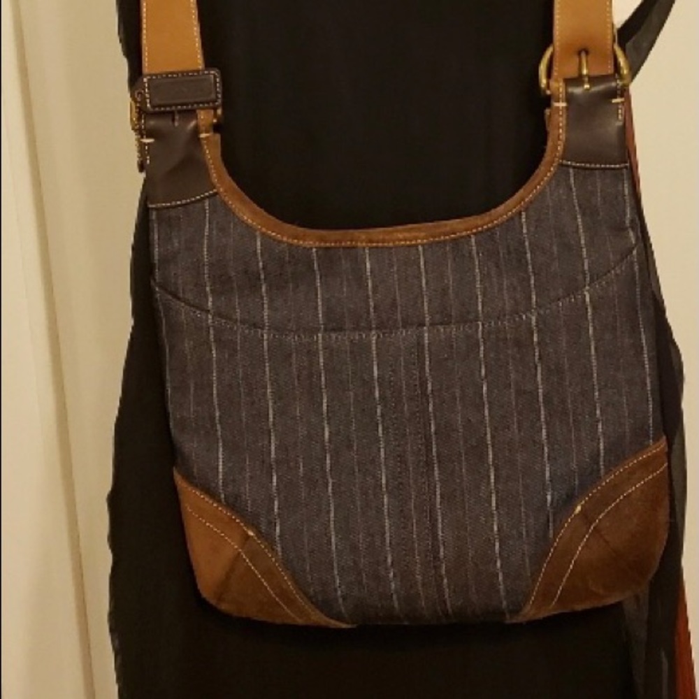 Coach purse never used! NO STAINS VERY CLEAN!